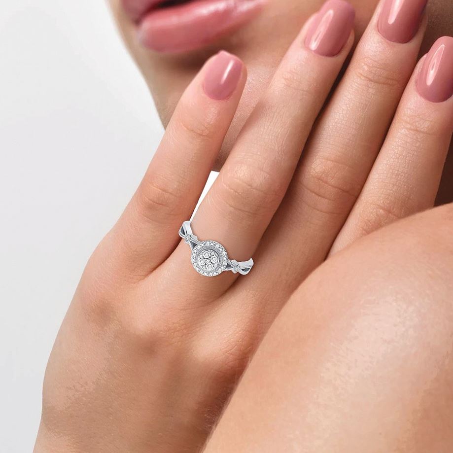 10K White Gold Magnifcnet 0.10Ct Diamond Ring