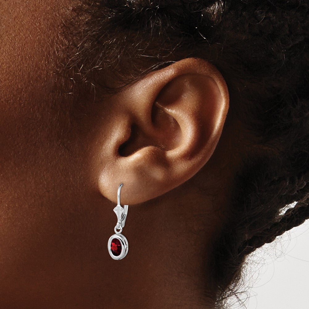 Sterling Silver Rhodium Plated 7x5mm Oval Garnet Leverback Earrings