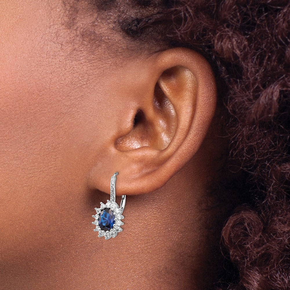 Cheryl M Sterling Silver Rhodium-plated Brilliant-cut Lab Created Dark Blue Spinel and Brilliant-cut White CZ Oval Halo Le...