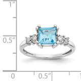 10k White Gold Diamond and Blue Topaz Ring 10X211