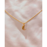 initial necklaces in yellow silver