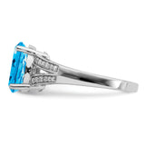 Sterling Silver Rhodium Diam. & Oval Blue Topaz Ring QR3043BT
