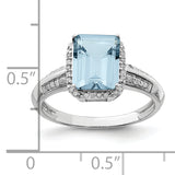 Sterling Silver Rhodium Diam. & Light Swiss Blue Topaz Ring QR3052LSBT